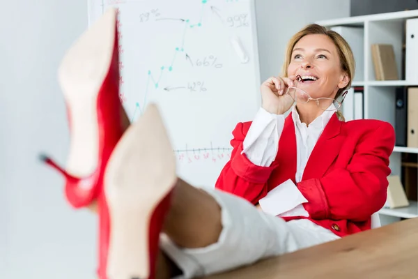 Attractive Businesswoman Laughing Sitting Legs Table Office — Stock Photo, Image
