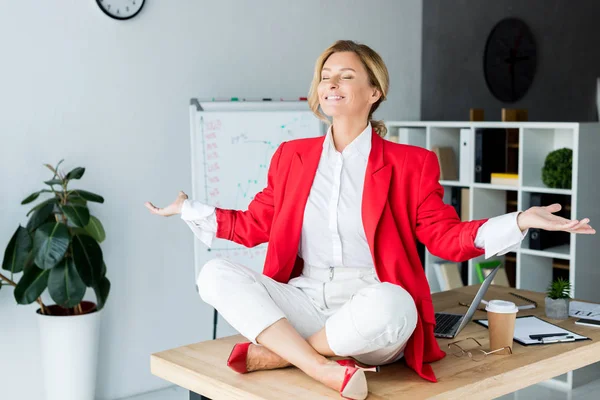 Happy Attractive Businesswoman Meditating Lotus Pose Table Office — Stock Photo, Image