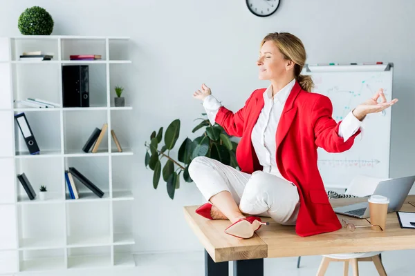 Attractive Businesswoman Meditating Lotus Pose Table Office — Stock Photo, Image