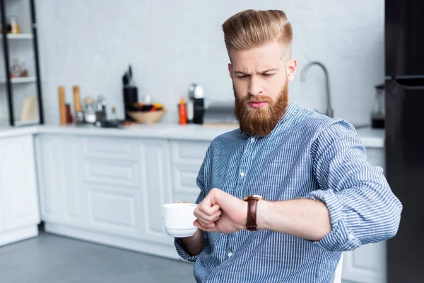 Handsome Bearded Young Man Holding Cup Coffee Checking Wristwatch — Stock Photo, Image