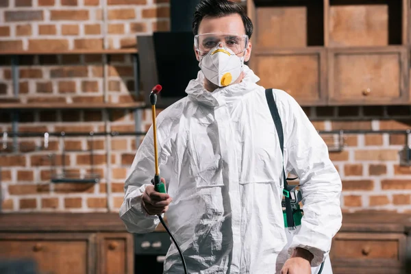 Pest Control Worker Standing Sprayer Kitchen Looking Camera — Stock Photo, Image