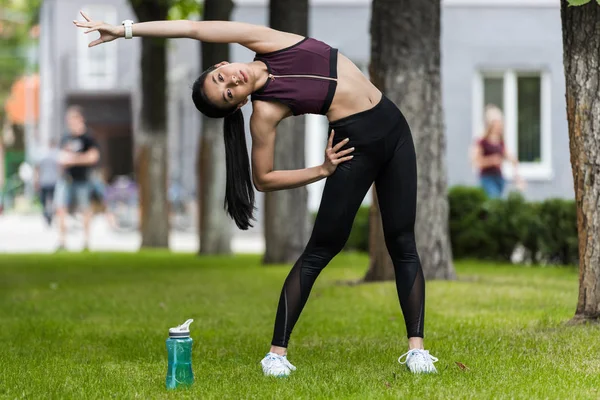 Asian Female Sportswoman Stretching Sport Bottle Water Grass Park — Stock Photo, Image