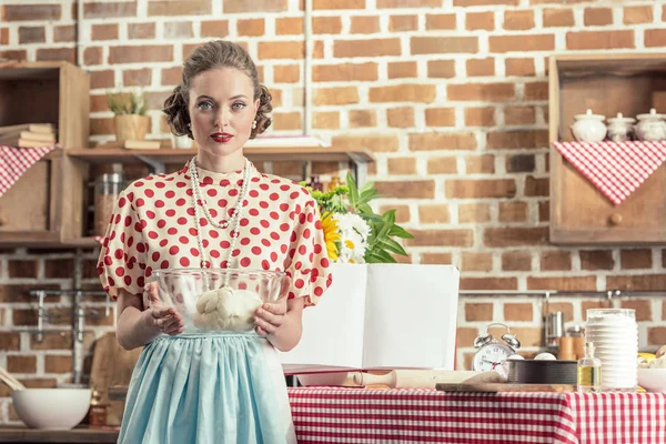 Beautiful Adult Housewife Holding Bowl Dough Looking Camera Kitchen — Free Stock Photo