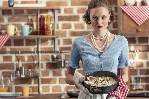 Smiling Adult Housewife Holding Baking Trey Looking Camera Kitchen — Stock Photo, Image