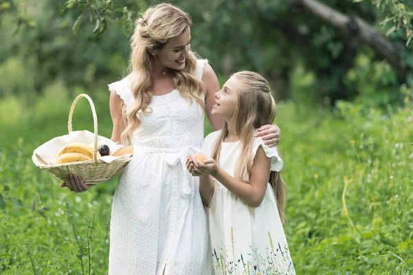 Adorable Daughter Mother Holding Wicker Basket Fruits — Stock Photo, Image