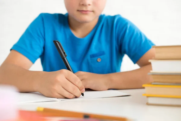 Partial View Boy Writing Copybook While Doing Homework Home — Stock Photo, Image