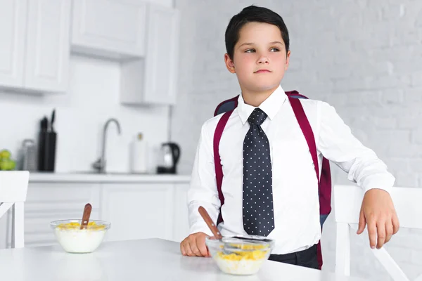 Portrait Pensive Boy School Uniform Backpack Standing Table Breakfast Kitchen — Stock Photo, Image