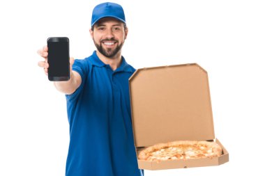 happy delivery man holding smartphone and pizza in box isolated on white   clipart