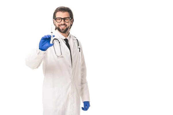 医療用手袋白で隔離シリンジを保持の笑みを浮かべて医師  — 無料ストックフォト
