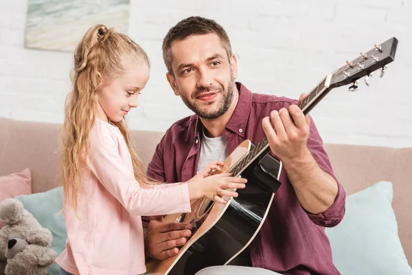 Father Daughter Having Fun Playing Guitar Sofa — Stock Photo, Image