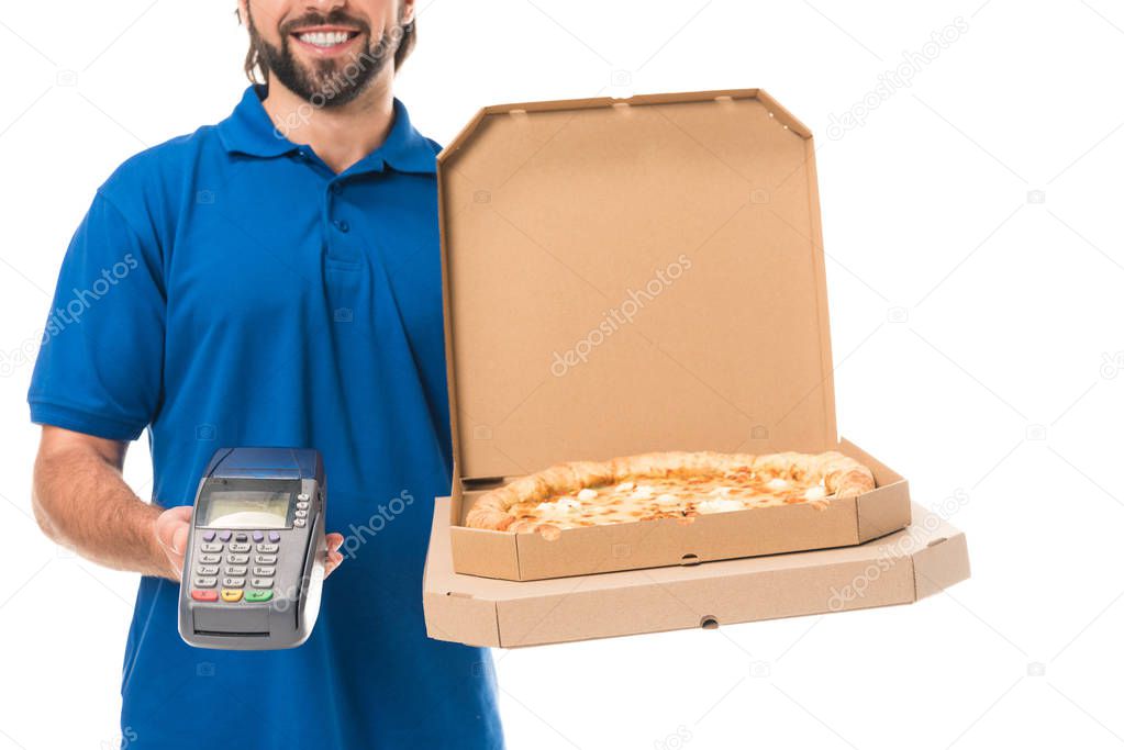 cropped shot of smiling delivery man holding pizza in boxes and mobile terminal isolated on white