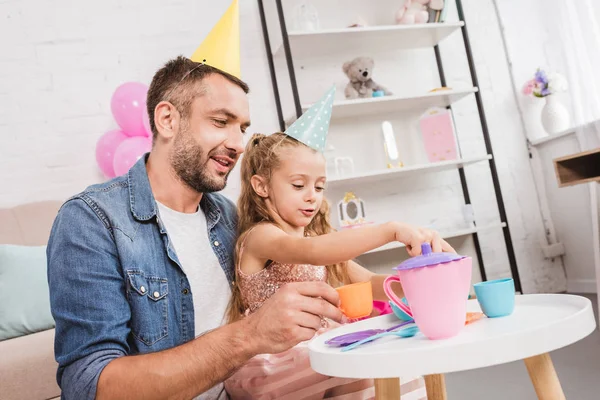 Father Daughter Playing Tea Party Home — Free Stock Photo