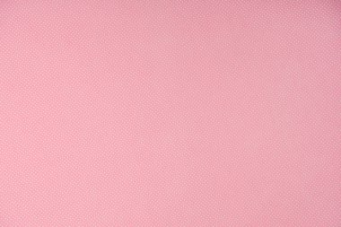pembe bir arka plan üzerinde beyaz lekeli, üstten görünüm