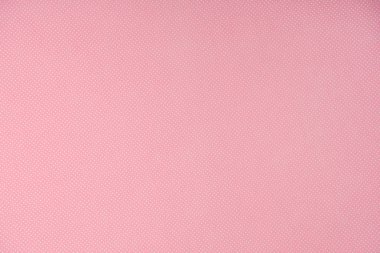 top view of white polka dots on pink background clipart