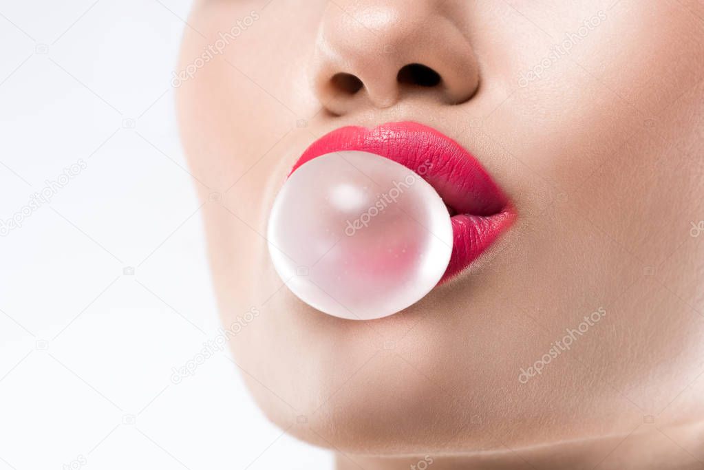 cropped view of woman with bubble of chewing gum, isolated on white