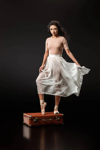 Elegant Ballerina White Skirt Standing Retro Suitcase Dark Background — Free Stock Photo