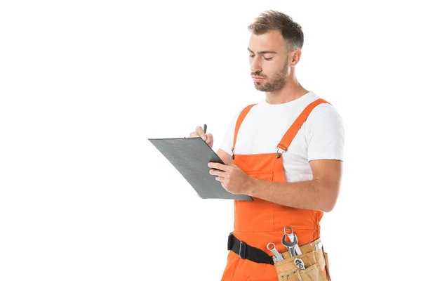 Handsome Auto Mechanic Orange Uniform Writing Something Clipboard Isolated White — Stock Photo, Image