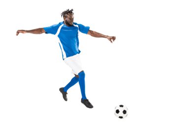 full length view of athletic african american soccer player hitting ball isolated on white  clipart