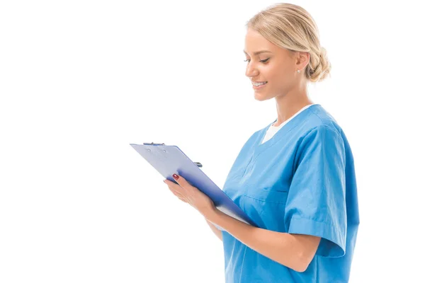 Confident Young Nurse Writing Clipboard Isolated White — Stock Photo, Image