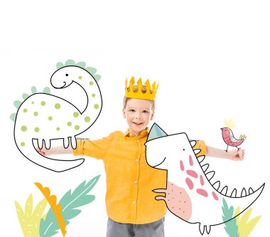 happy boy in yellow crown with imaginary dinosaurs on outstretched hands isolated on white  clipart