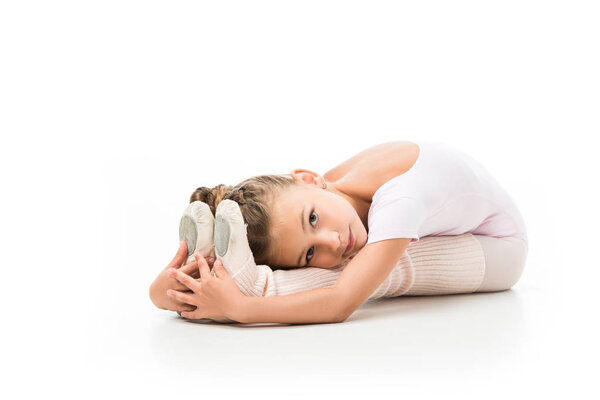 beautiful child stretching and looking at camera isolated on white background 