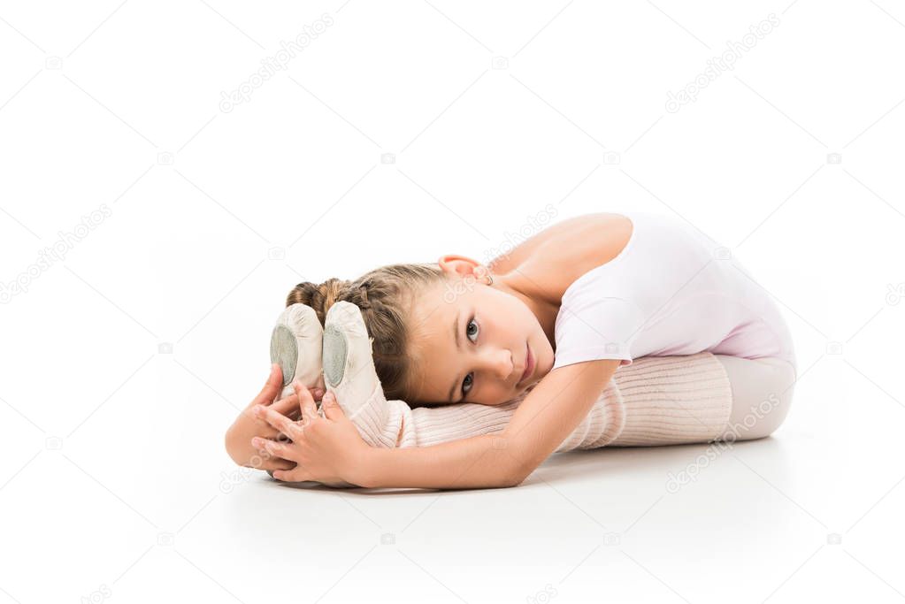 beautiful child stretching and looking at camera isolated on white background 