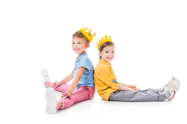 Smiling Friends Yellow Paper Crowns Sitting Back Back Isolated White — Stock Photo, Image