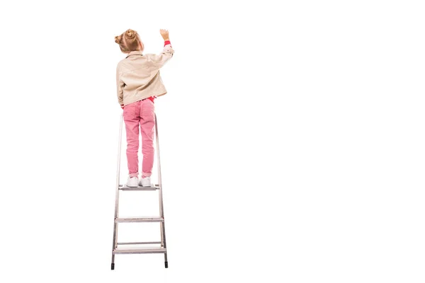 Rear View Schoolchild Standing Ladder Writing Isolated White — Stock Photo, Image