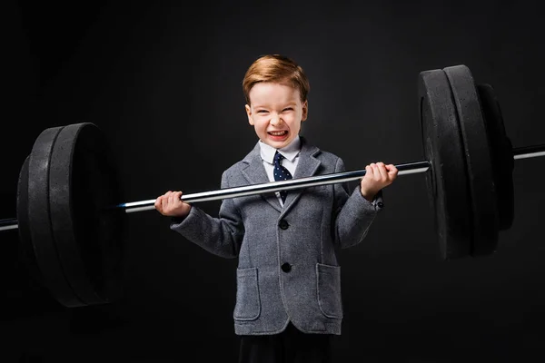 Ισχυρό Μικρό Αγόρι Άρση Της Barbell Απομονώνονται Γκρι Κοστούμι — Φωτογραφία Αρχείου