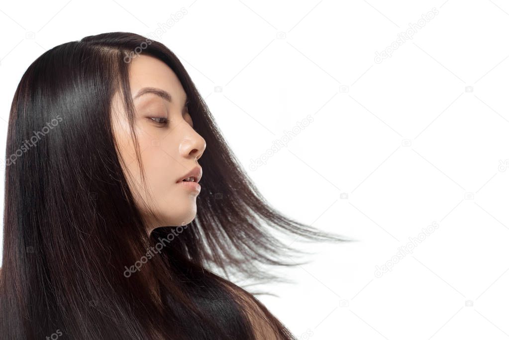 portrait of young asian woman with beautiful and healthy hair isolated on white