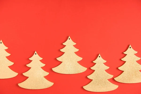 Close View Decorative Fir Trees Red Background — Free Stock Photo