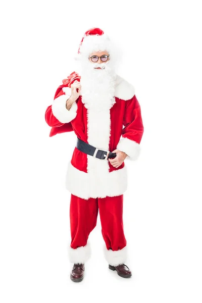 Smiling Santa Claus Eyeglasses Holding Christmas Sack Shoulder Isolated White — Stock Photo, Image