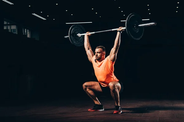 Attractive Athletic Man Working Out Barbell Dark Gym — Stock Photo, Image