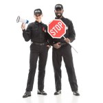 Happy police officers with stop road sign and megaphone looking at camera isolated on white, aids awareness concept