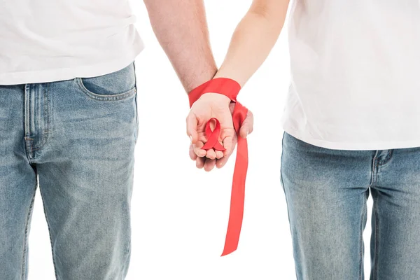 Cropped Shot Couple Holding Hands Tied Red Ribbon Isolated White — Stock Photo, Image