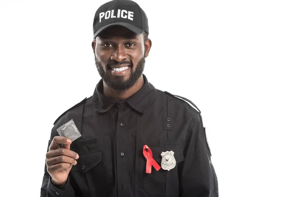 Happy African American Police Officer Aids Awareness Red Ribbon Holding — Free Stock Photo