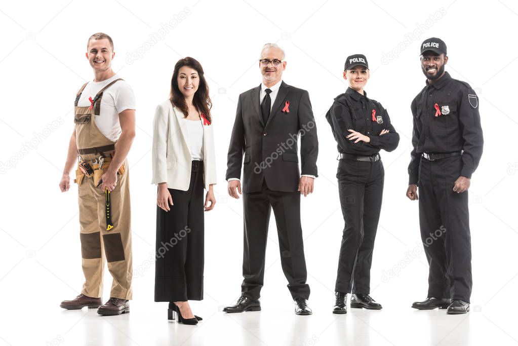 group of smiling people with various professions and aids awareness red ribbons isolated on white