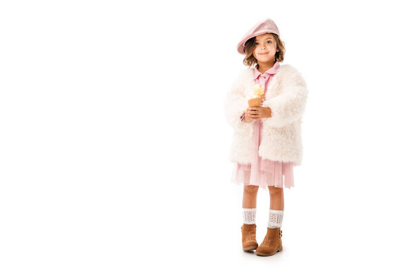 adorable happy child in stylish clothes with ice cream looking at camera isolated on white