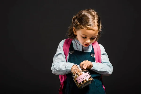 Schoolgirl Backpack Holding Glass Jar Savings Education Isolated Black — Stock Photo, Image