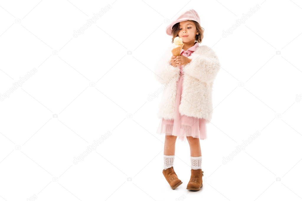 beautiful happy child in stylish clothes with ice cream isolated on white