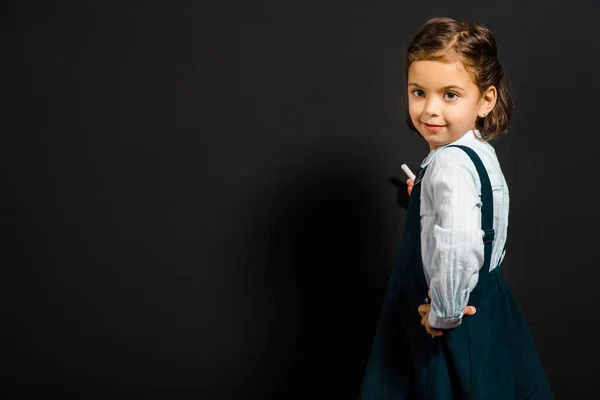 Schoolgirl Piece Chalk Standing Blank Blackboard — Stock Photo, Image