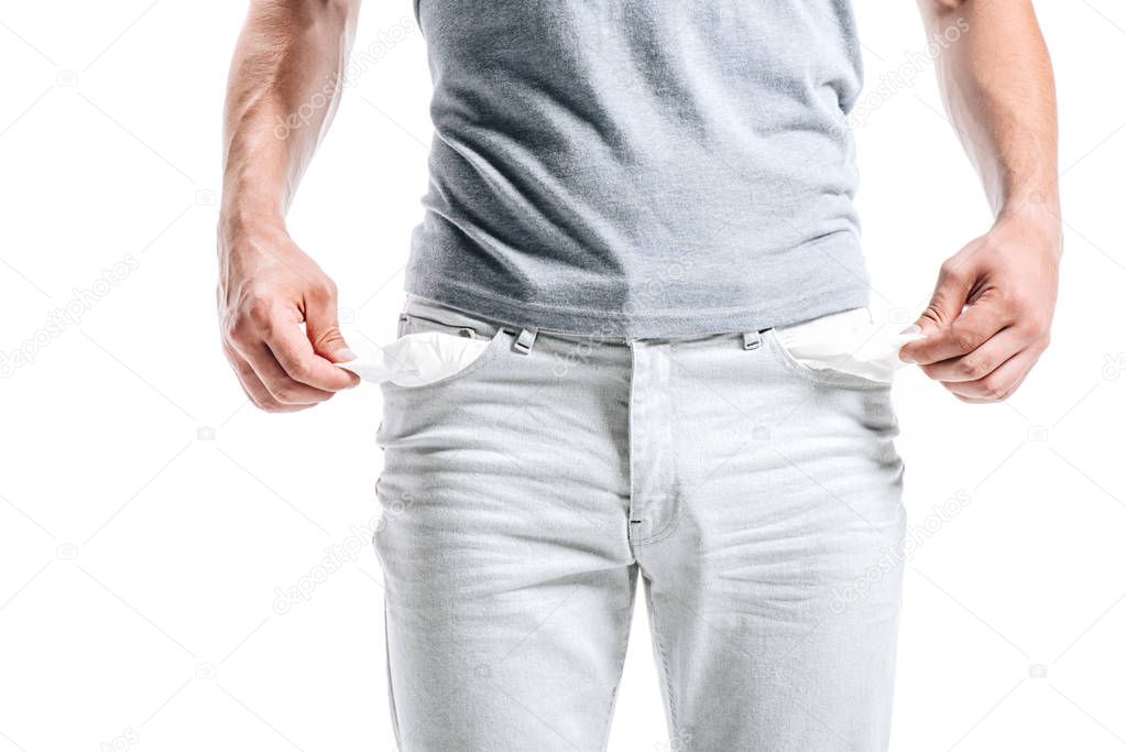 cropped image of man showing empty pockets isolated on white