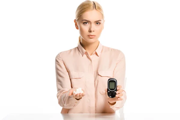 Attractive Serious Blonde Woman Holding Refined Sugar Glucometer Isolated White — Stock Photo, Image