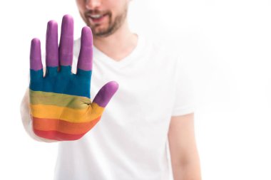 Eşcinsel adam el boyalı beyaz izole gurur bayrak renkleri gösterilen görüntü kırpılmış, Dünya AIDS Günü kavramı