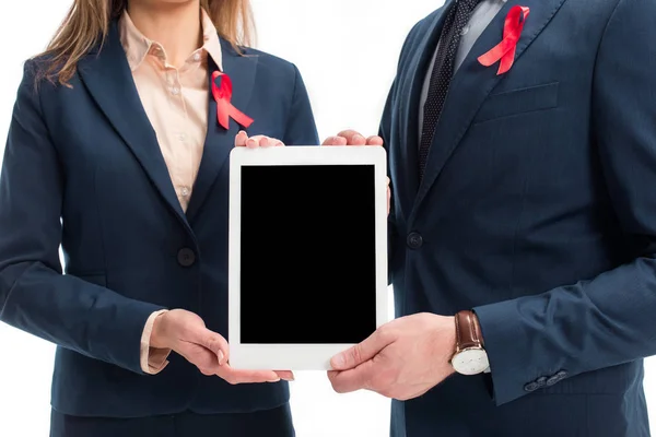 Cropped Image Businesspeople Red Ribbons Suits Holding Tablet Blank Screen — Free Stock Photo