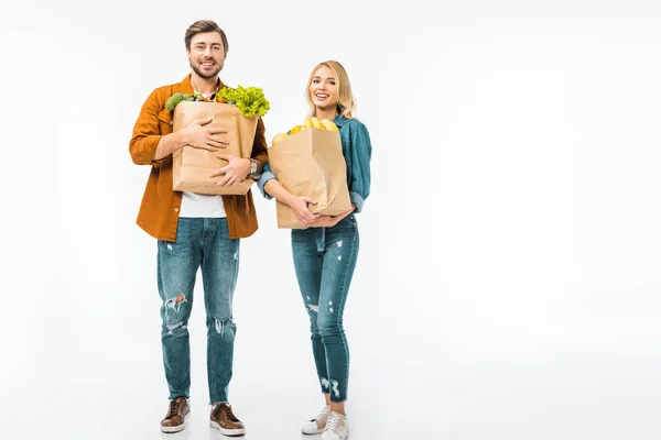 Positive Young Couple Paper Bags Full Products Isolated White — Stock Photo, Image