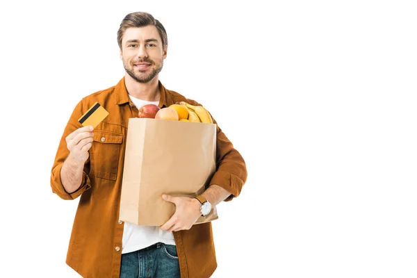 Uomo Sorridente Con Shopping Bag Pieno Prodotti Che Mostrano Carta — Foto Stock