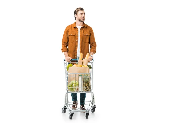 Stilig Man Transporterar Shopping Vagn Med Produkter Papperspåsar Isolerad Vit — Stockfoto