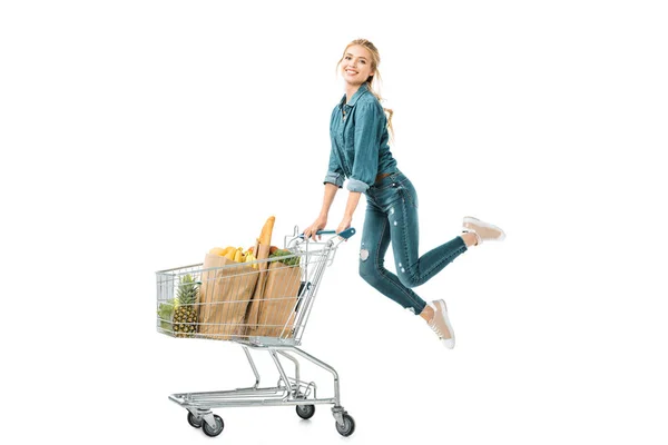 Happy Young Woman Jumping Shopping Trolley Cart Products Paper Bags — Stock Photo, Image