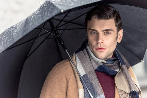 Handsome Man Coat Scarf Umbrella Looking Camera Street — Free Stock Photo